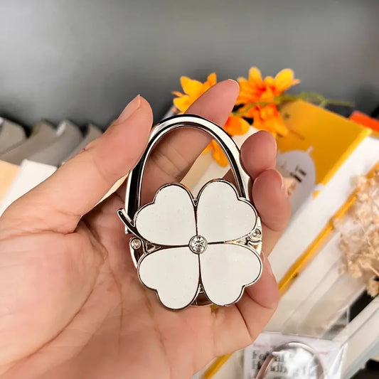 CloverGrip – Elegant Taske Krog med Firekløver Design