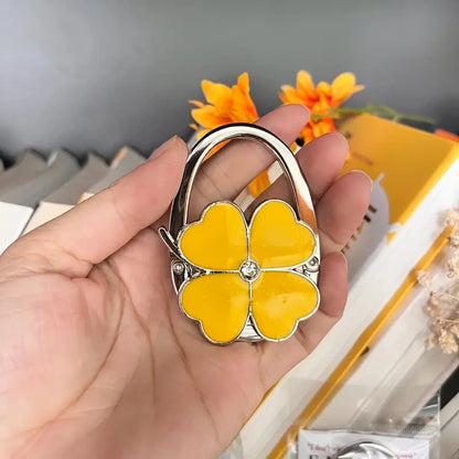 CloverGrip – Elegant Taske Krog med Firekløver Design